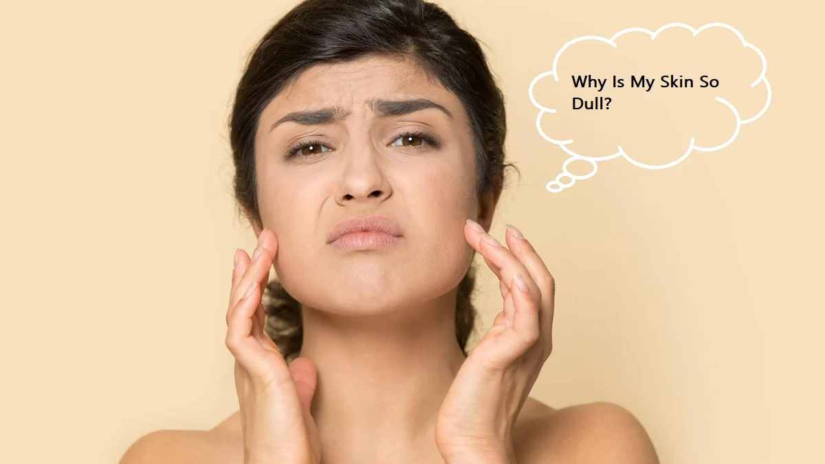 Woman with concerned expression touching her face and wondering why is my skin so dull, illustrating frustration with lackluster complexion despite skincare products routine